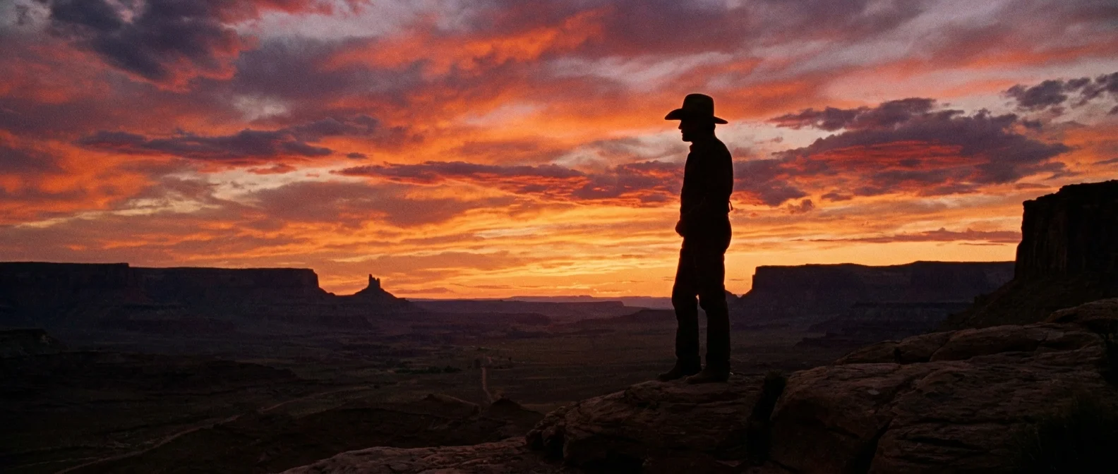 Iconic silhouette of a Cowboy hat against a sunset.